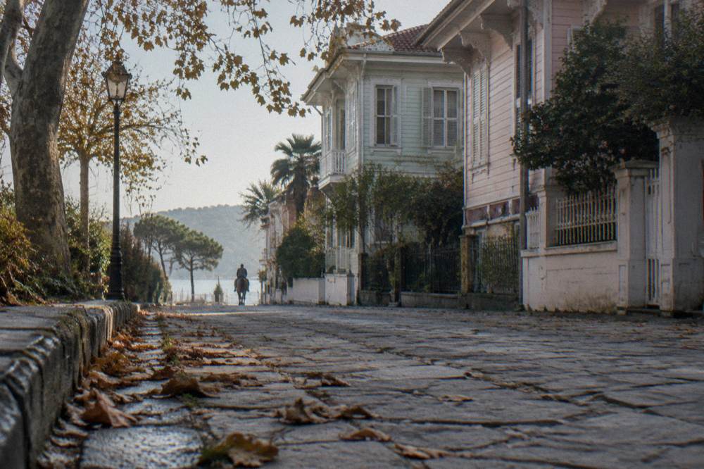 Quiet island street in soft morning light with no traffic