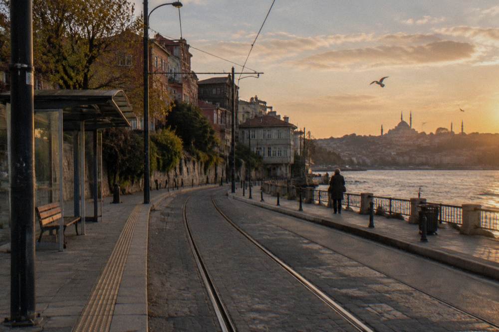 Tram tracks and station platform beside the Golden Horn waterfront road