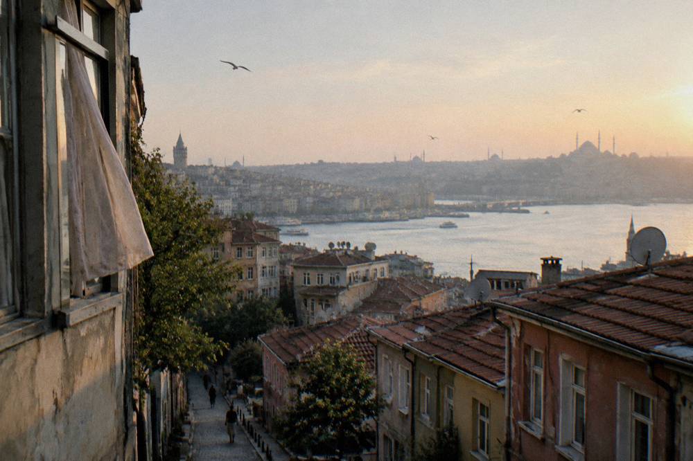 Rooftops of Galata district sloping down toward the Golden Horn and city skyline